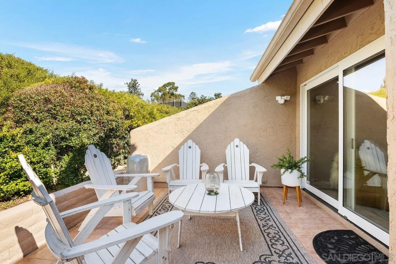 2224 Caminito Cabala La Jolla, CA 92037 - Photo 13 of 36 a view of a patio with couches table and chairs and potted plants
