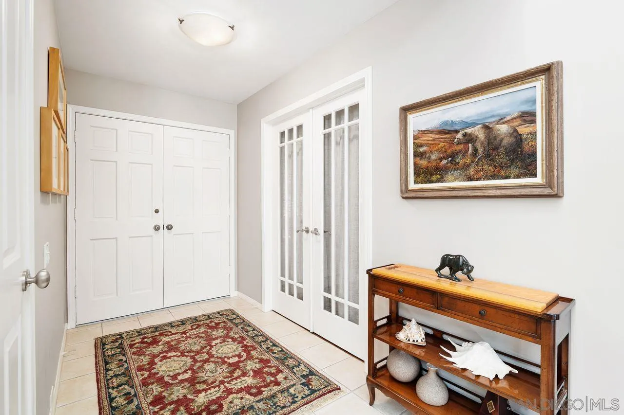 2224 Caminito Cabala La Jolla, CA 92037 - Photo 26 of 36 a view of a hallway with workspace and a window