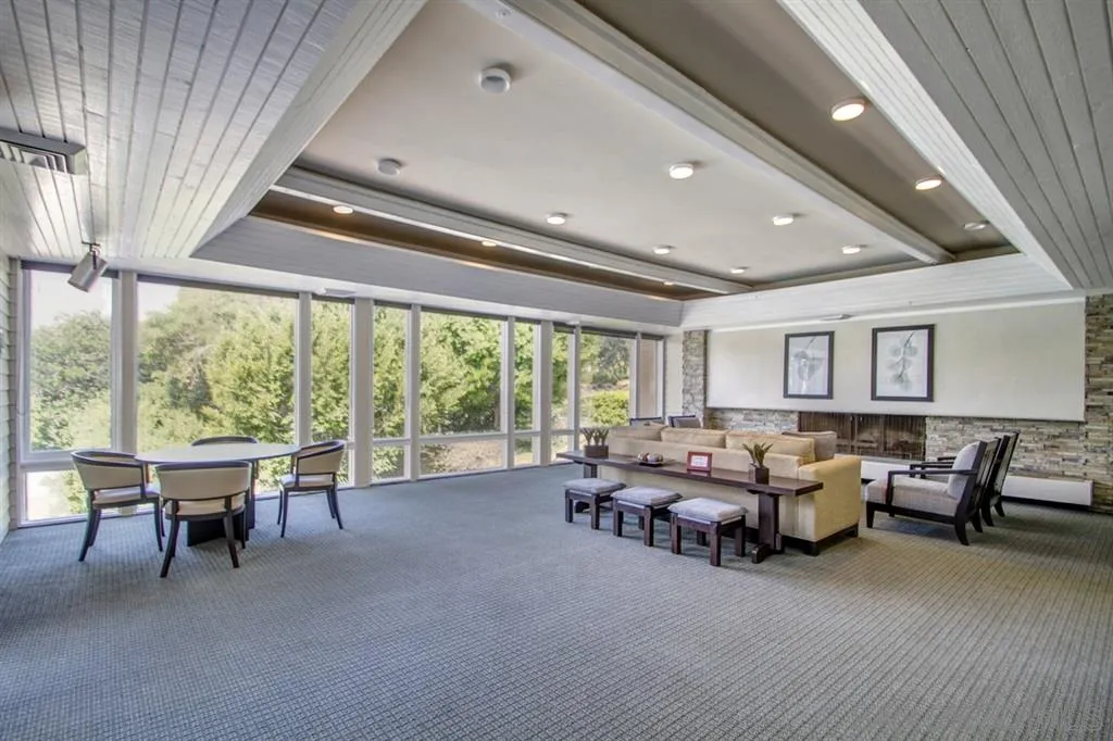 2224 Caminito Cabala La Jolla, CA 92037 - Photo 28 of 36 a living room with furniture and a large window