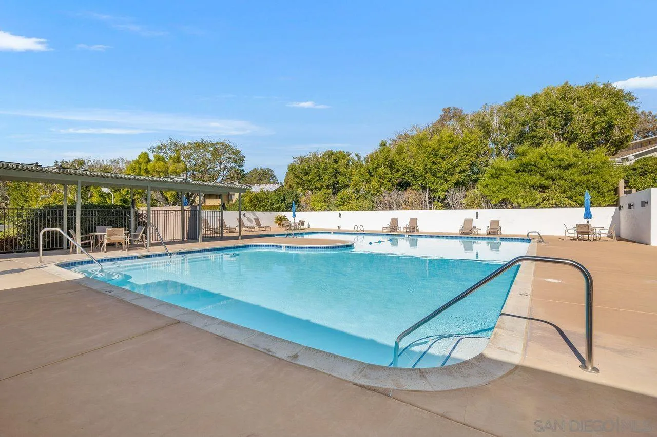 2224 Caminito Cabala La Jolla, CA 92037 - Photo 32 of 36 a view of a swimming pool with a lounge chair