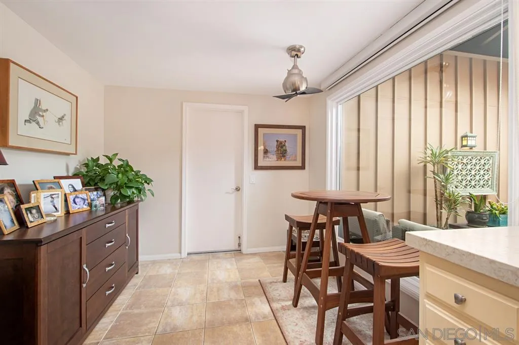 2224 Caminito Cabala La Jolla, CA 92037 - Photo 10 of 36 a view of a dining room with furniture and a window