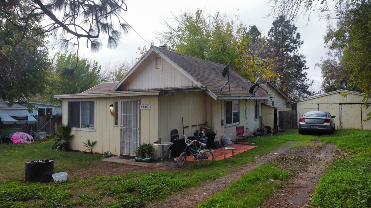 4621 Swanson Road Denair, CA 95316 - Photo 16 of 57 a front view of a house with a yard and trees