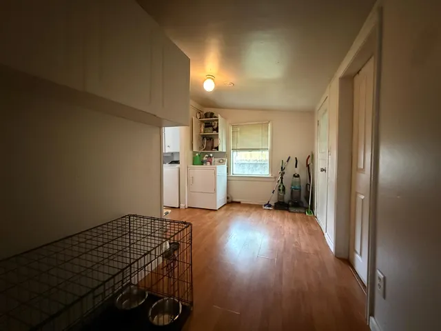 a bed room with furniture and a ceiling fan
