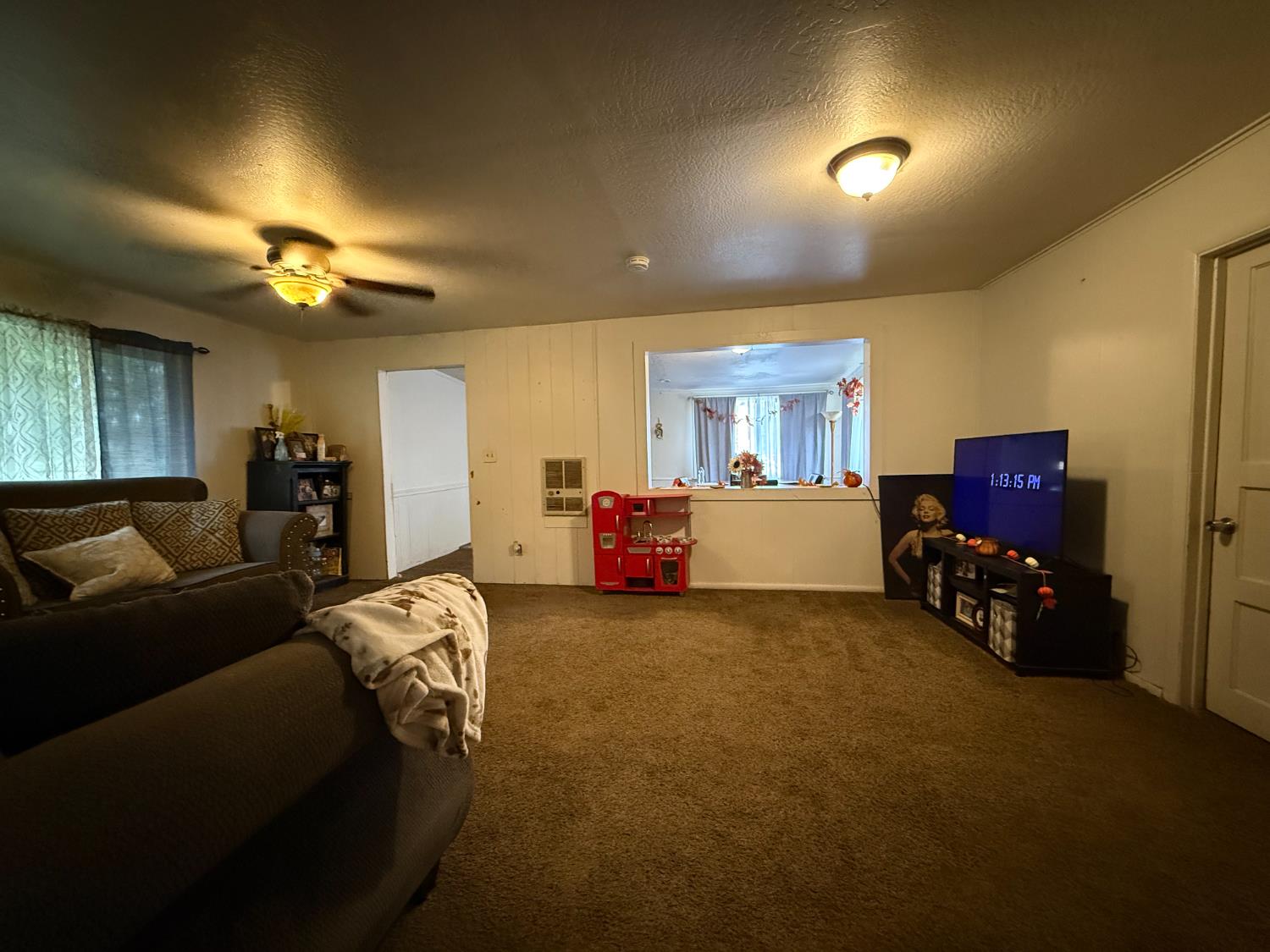 4621 Swanson Road Denair, CA 95316 - Photo 20 of 57 a bed room with furniture and a ceiling fan