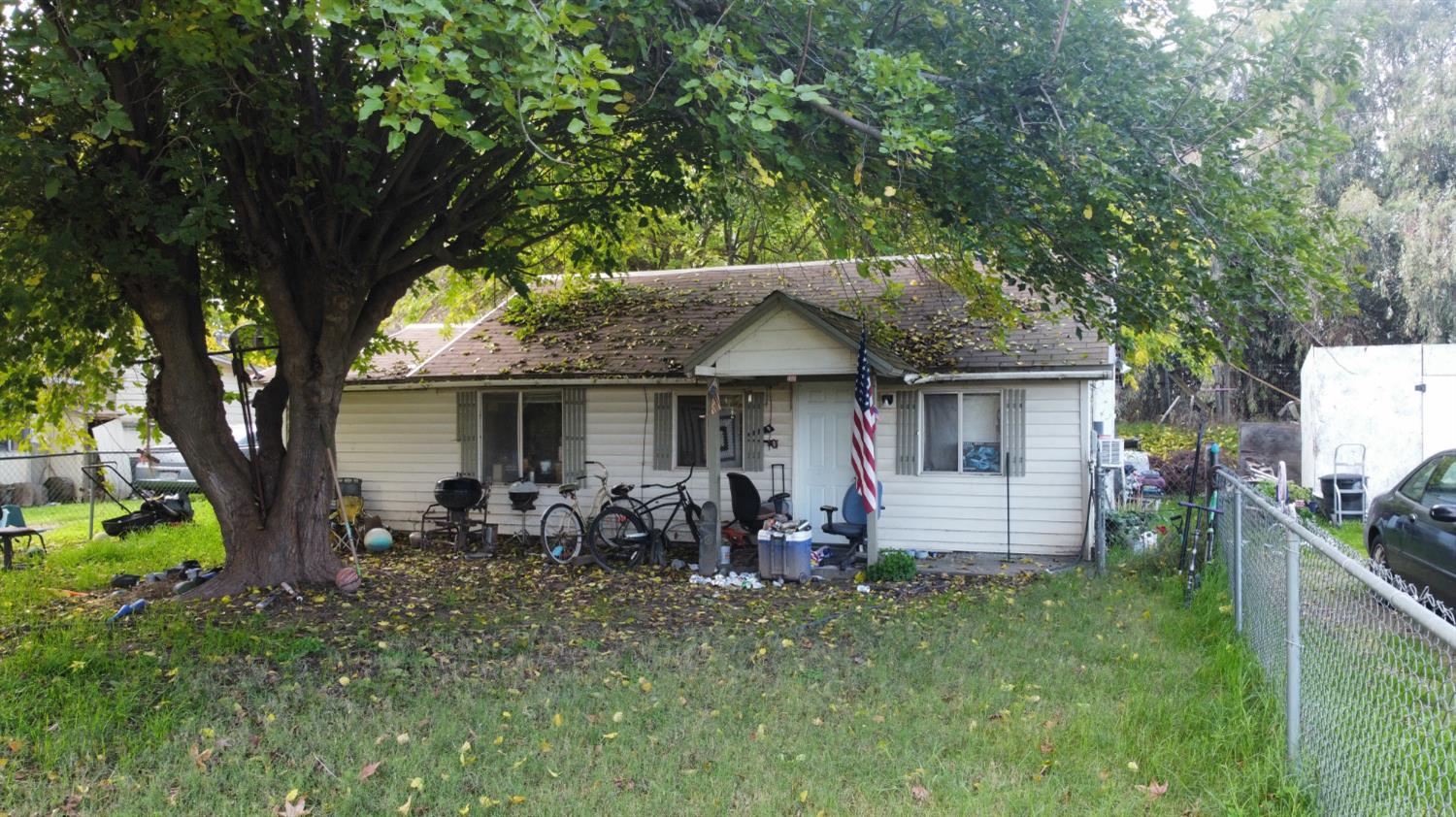 4621 Swanson Road Denair, CA 95316 - Photo 24 of 57 a front view of house with outdoor seating and green space