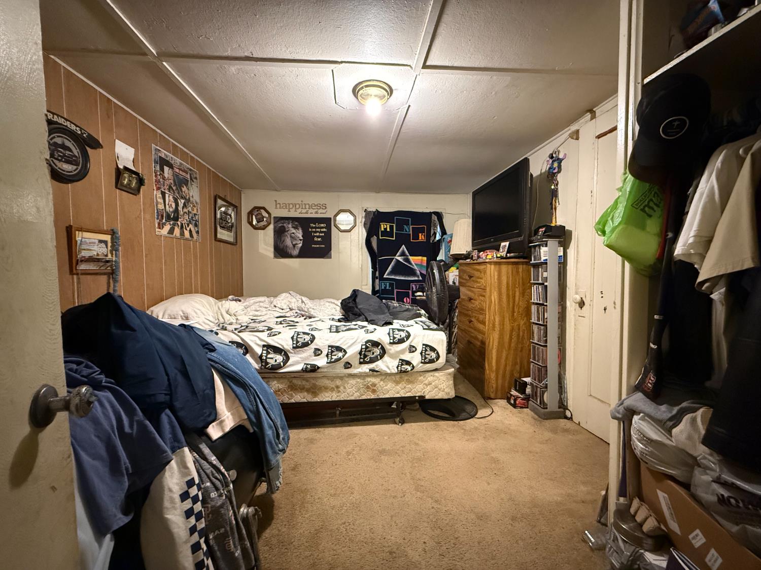 4621 Swanson Road Denair, CA 95316 - Photo 29 of 57 a bedroom with a bed and a walk in closet