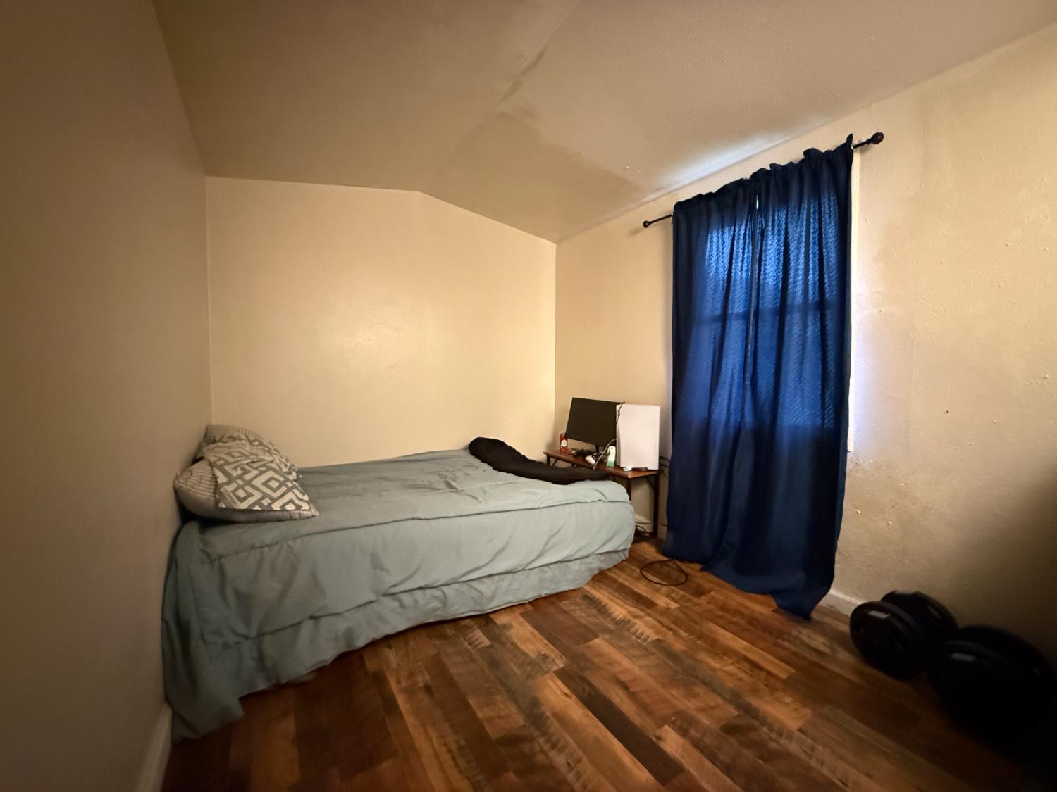 4621 Swanson Road Denair, CA 95316 - Photo 35 of 57 a bedroom with a bed and a window