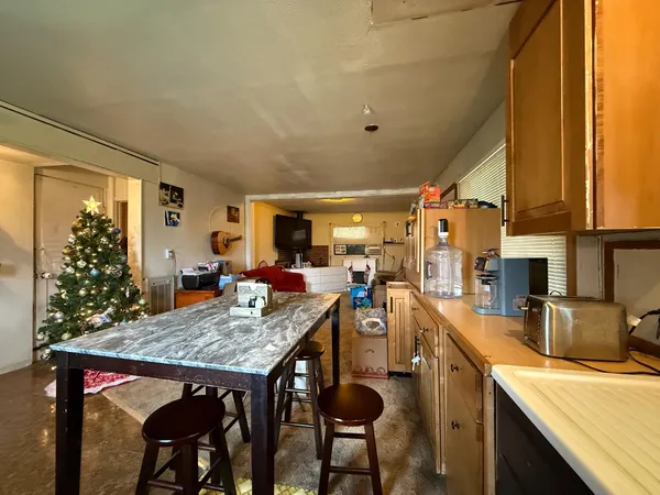 a front view of a house with a fence