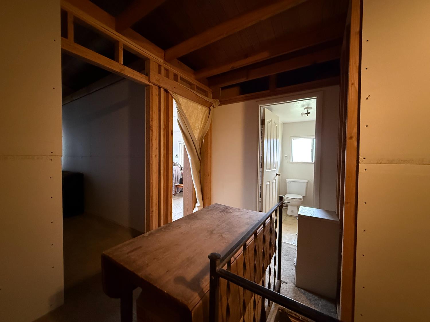 4621 Swanson Road Denair, CA 95316 - Photo 43 of 57 a view of a hallway with wooden floor and staircase