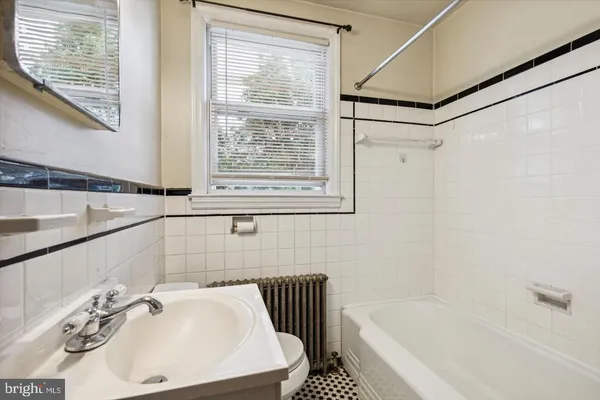 a bathroom with a sink and a bathtub