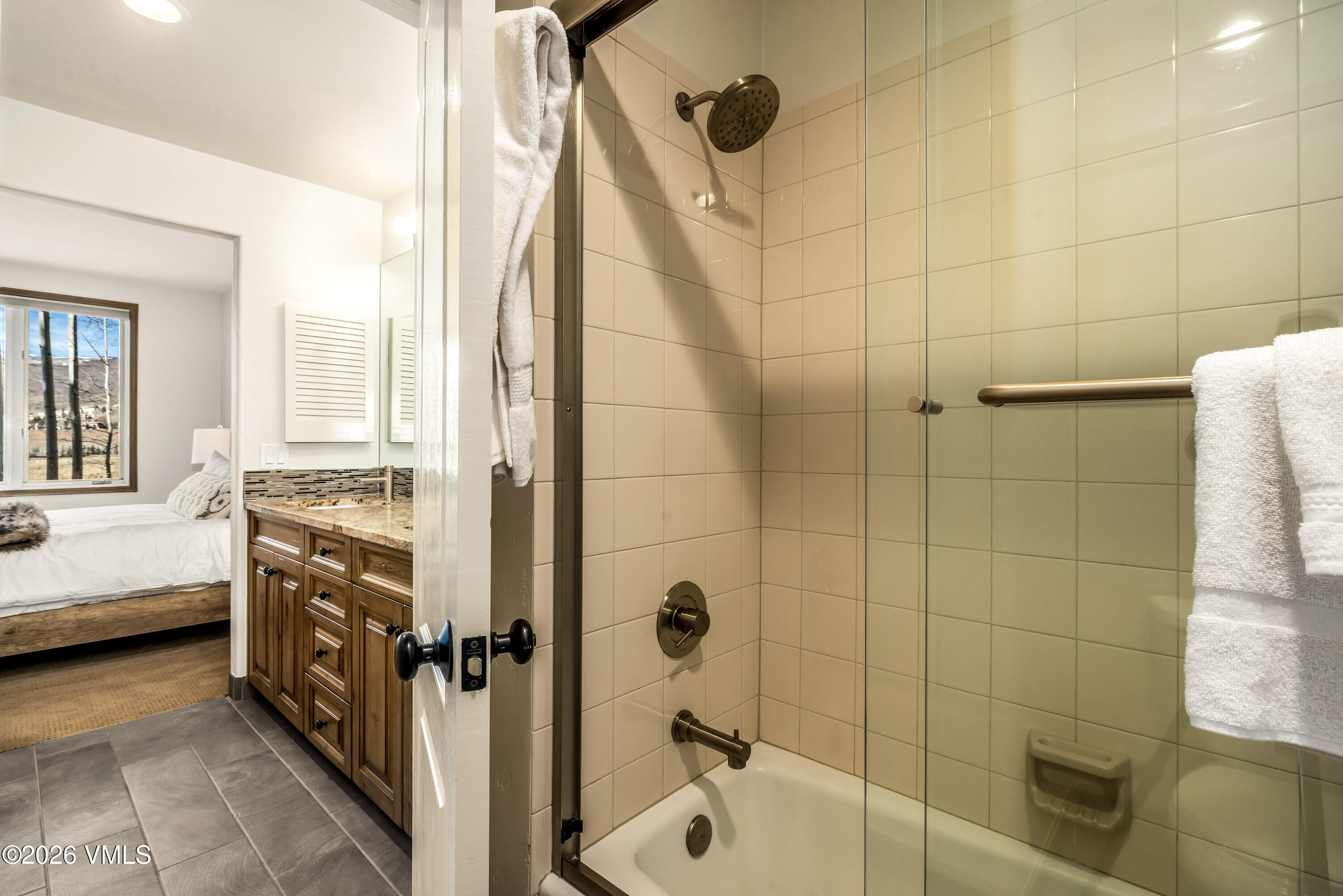 600 Sawatch Drive, Unit 101 Edwards, CO 81632 - Photo 18 of 34 a bathroom with a tub and a sink