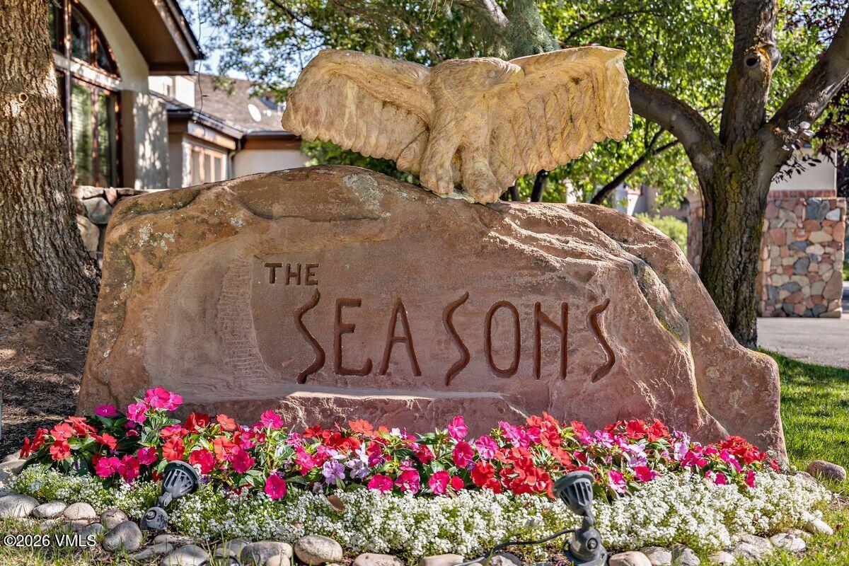 600 Sawatch Drive, Unit 101 Edwards, CO 81632 - Photo 30 of 34 a sign that is in front of flowers