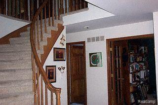 FOYER AND SWEEPING STAIRWAY