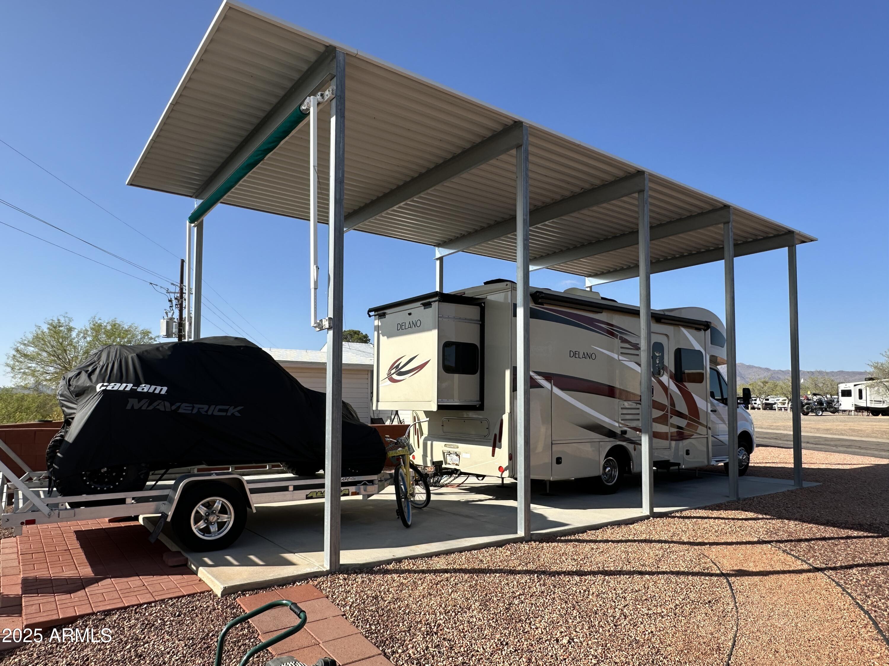 30530 Burnt Sage Road, Unit 278 Congress, AZ 85332 - Photo 3 of 13 a view of outdoor space and deck