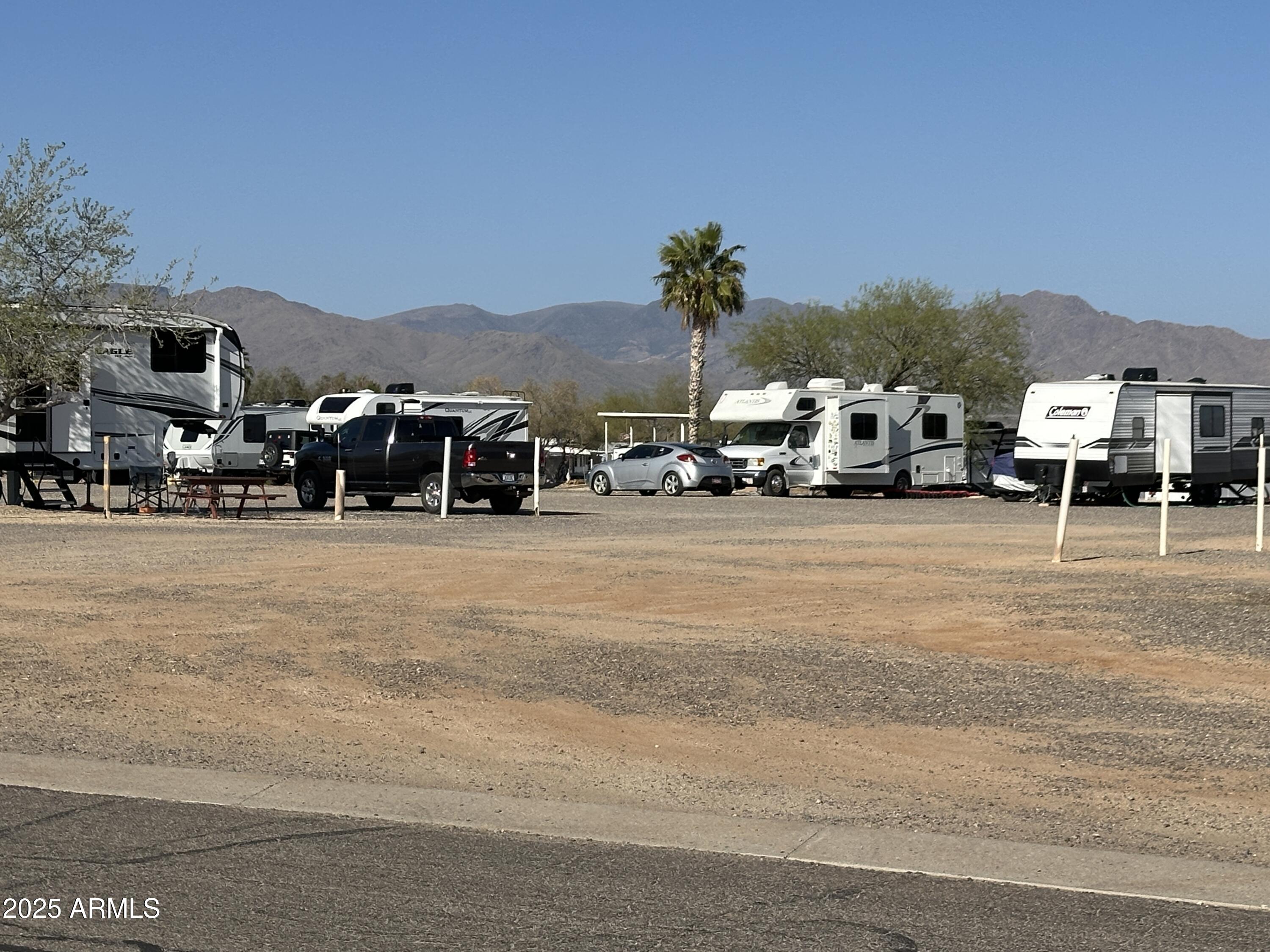 30530 Burnt Sage Road, Unit 278 Congress, AZ 85332 - Photo 8 of 13 a view of street with parked cars