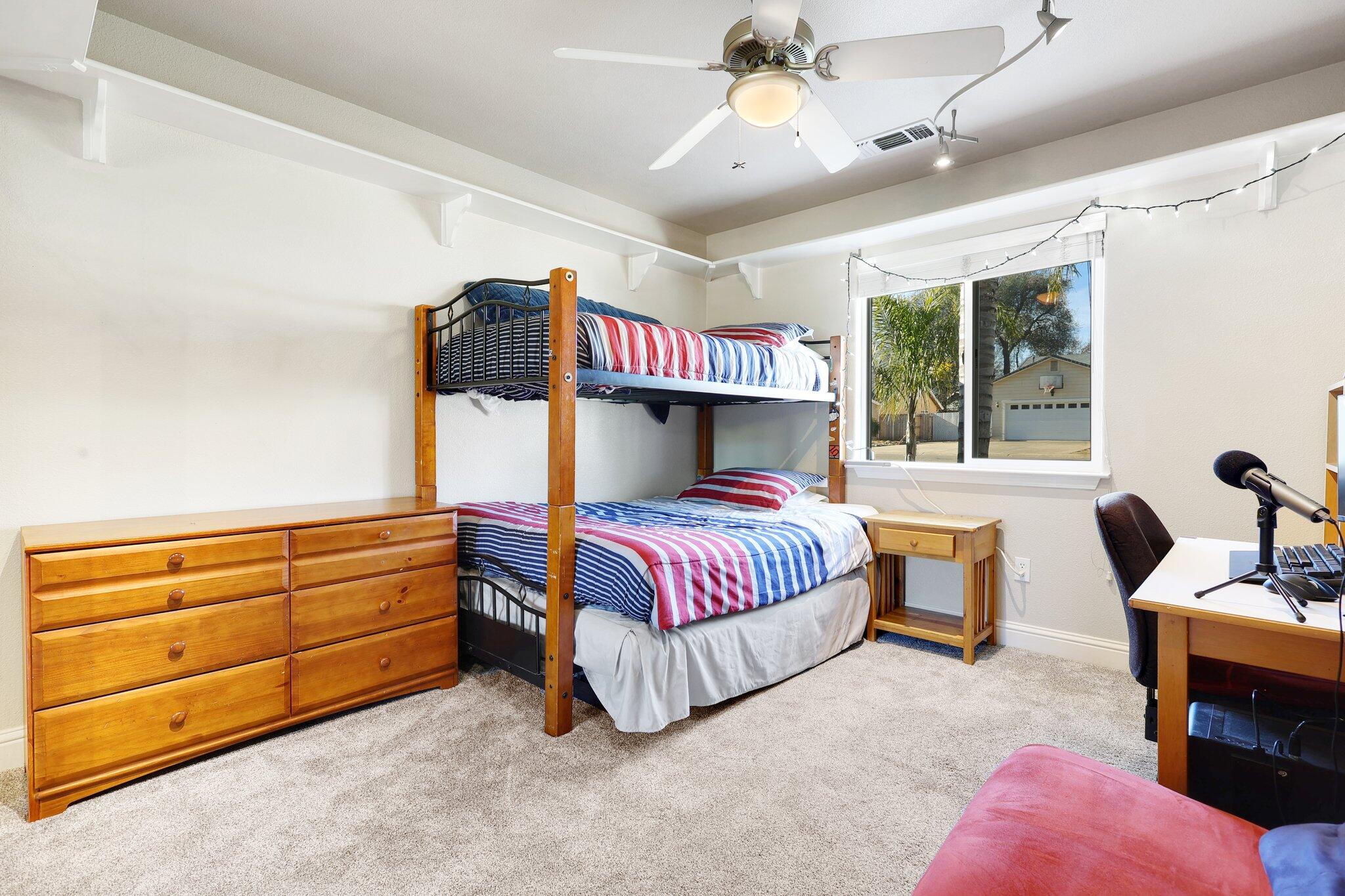 3375 Lawrence Road Redding, CA 96002 - Photo 20 of 46 a bedroom with a bed and window
