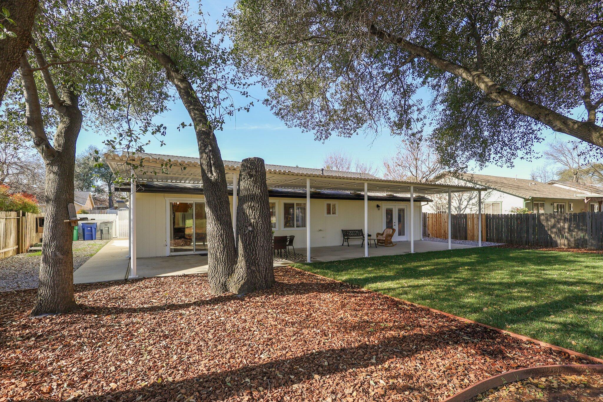 3375 Lawrence Road Redding, CA 96002 - Photo 30 of 46 a view of a house with a yard