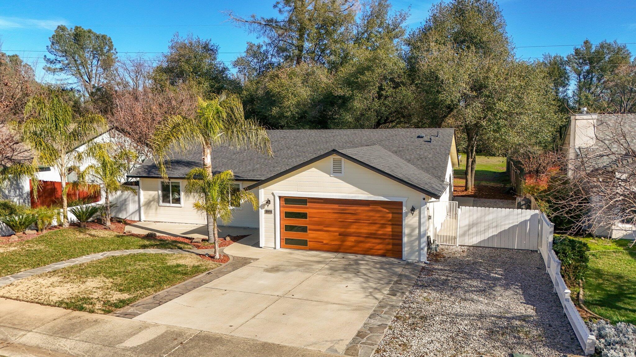 3375 Lawrence Road Redding, CA 96002 - Photo 35 of 46 a front view of a house with a yard