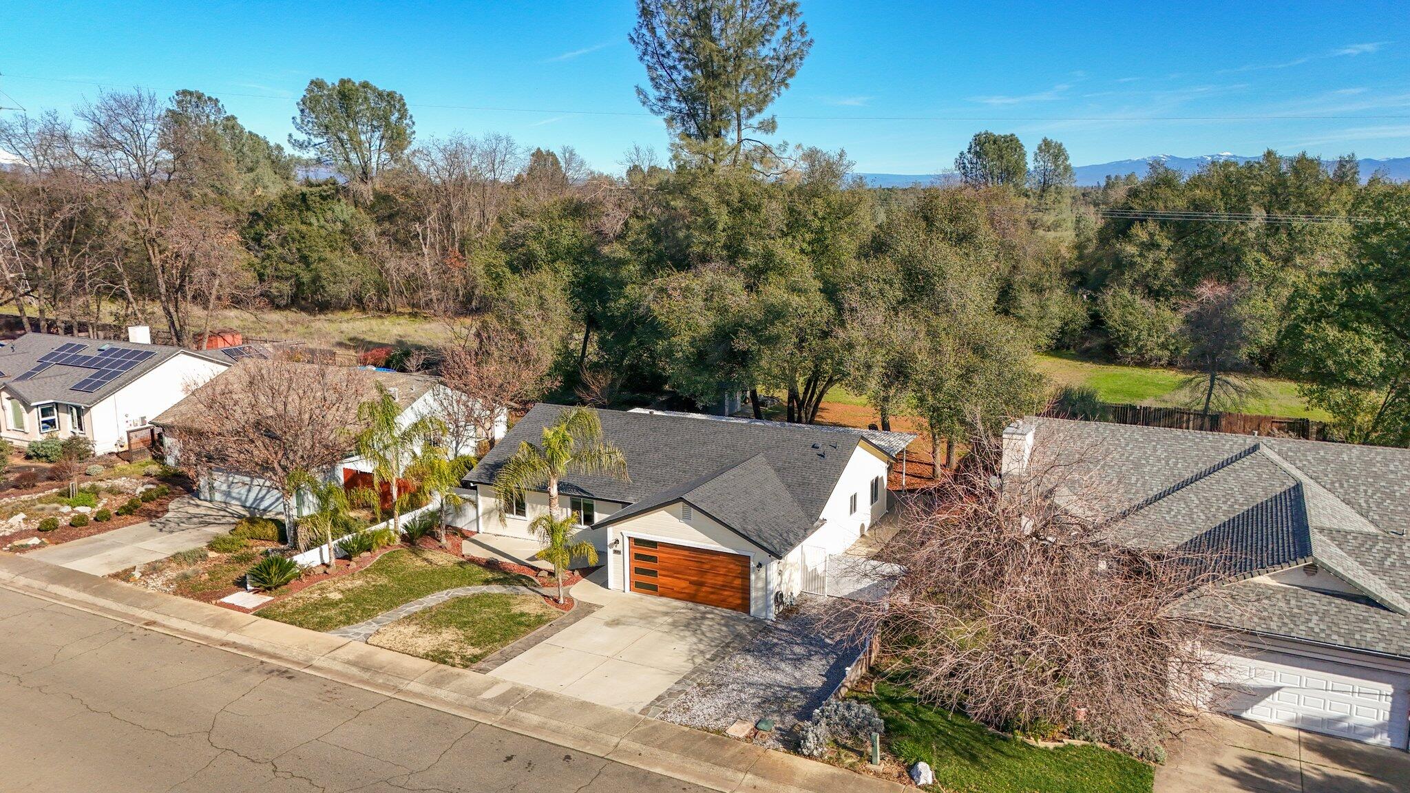 3375 Lawrence Road Redding, CA 96002 - Photo 36 of 46 an aerial view of a house with a garden