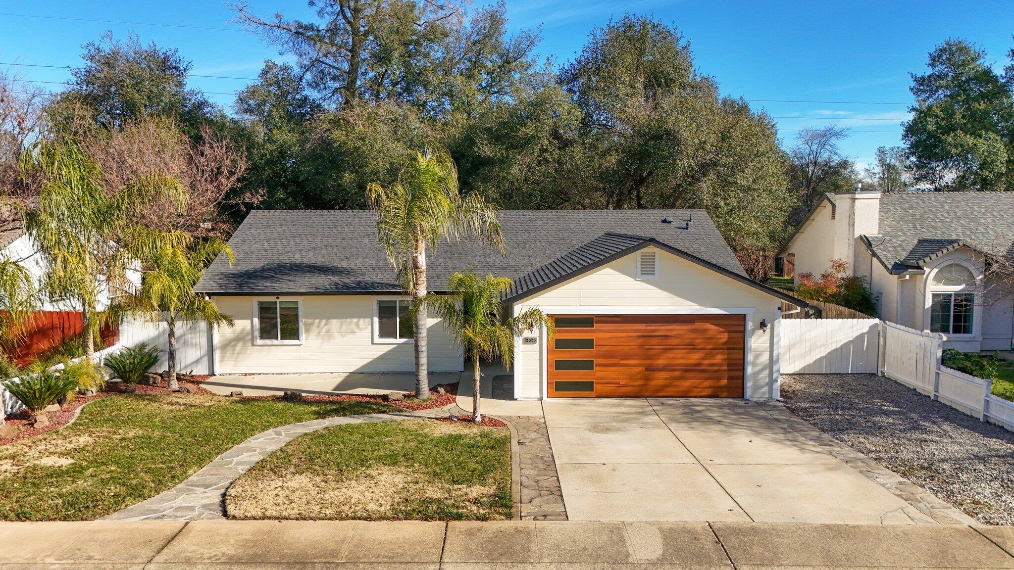 3375 Lawrence Road Redding, CA 96002 - Photo 4 of 46 front view of a house with a yard