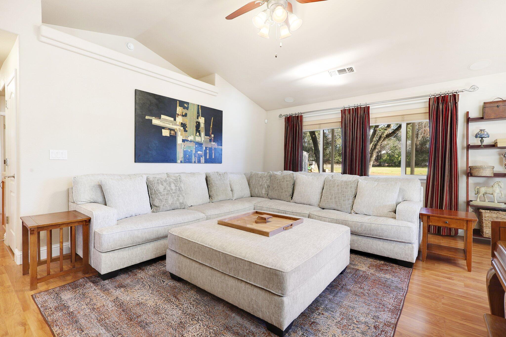 3375 Lawrence Road Redding, CA 96002 - Photo 7 of 46 a living room with furniture and a large window