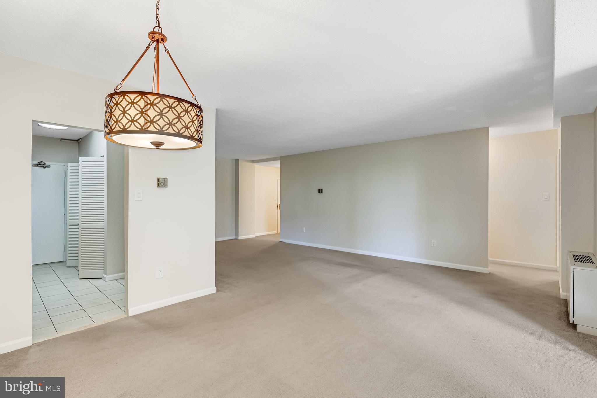 4141 North Henderson Road, Unit 303 Arlington, VA 22203 - Photo 12 of 41 Dining Room Looking Toward Living Room
