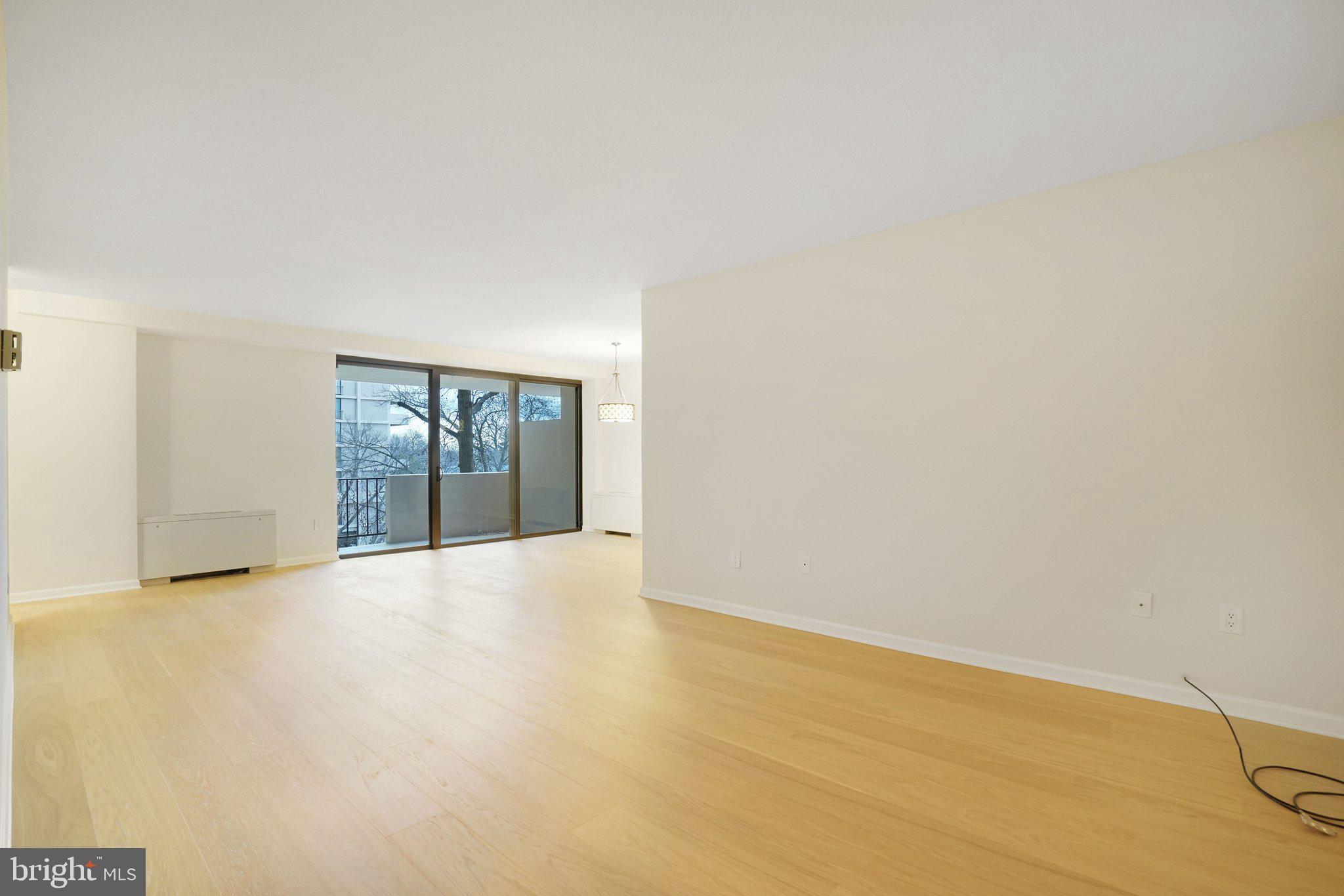 4141 North Henderson Road, Unit 303 Arlington, VA 22203 - Photo 13 of 37 a view of an empty room with a window