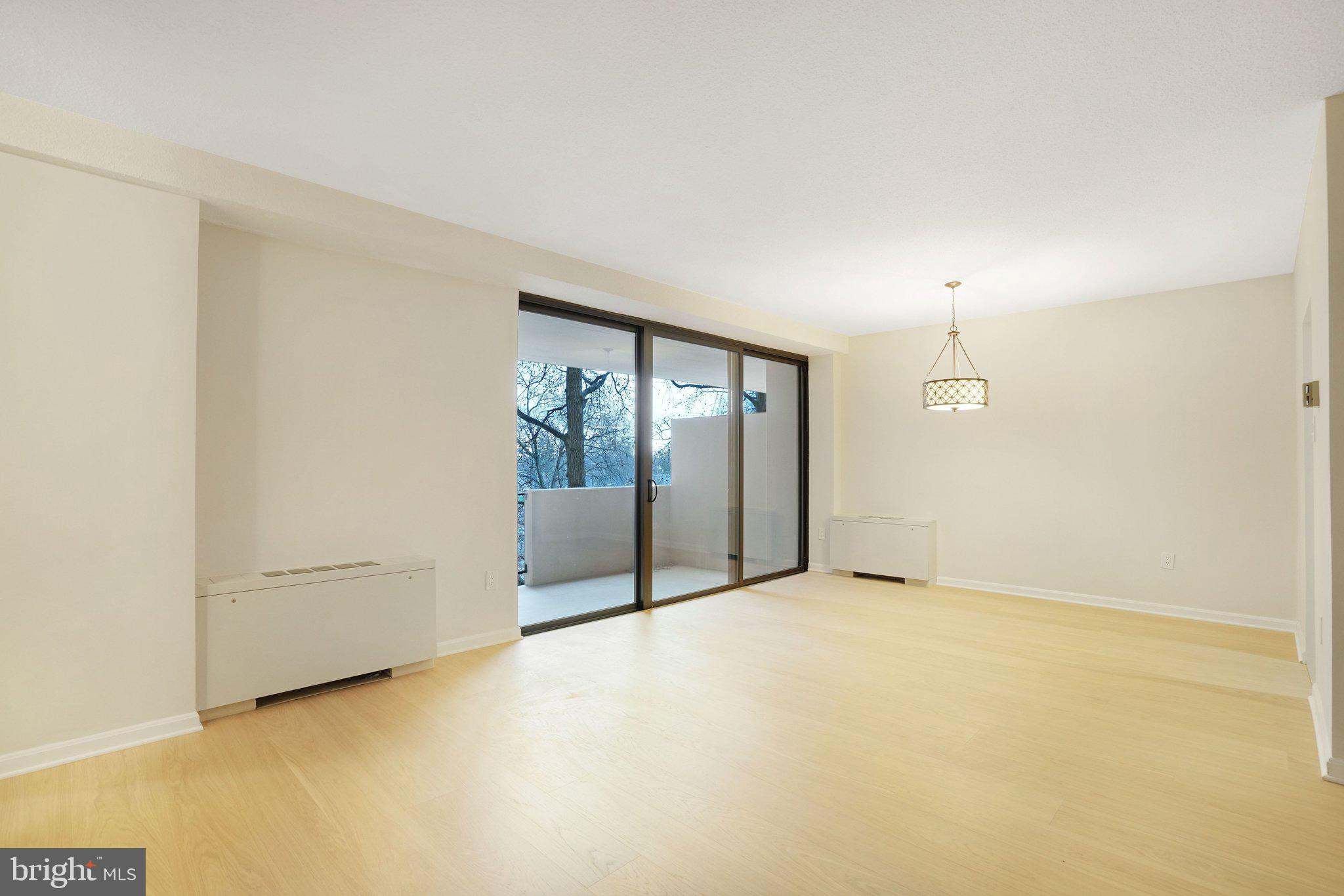 4141 North Henderson Road, Unit 303 Arlington, VA 22203 - Photo 16 of 37 an empty room with sliding door