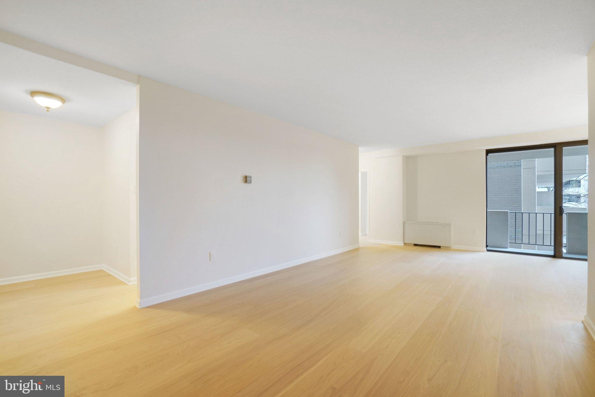 4141 North Henderson Road, Unit 303 Arlington, VA 22203 - Photo 25 of 37 a view of an empty room with glass door