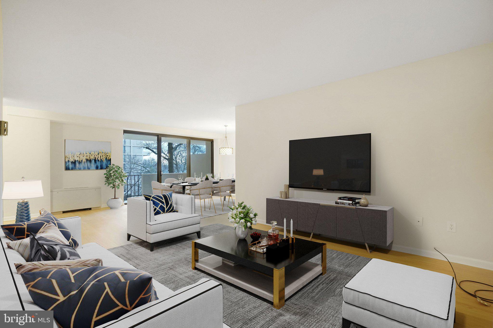 4141 North Henderson Road, Unit 303 Arlington, VA 22203 - Photo 3 of 37 a living room with furniture and a flat screen tv