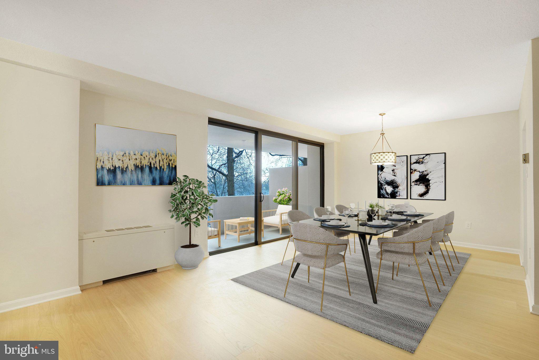 4141 North Henderson Road, Unit 303 Arlington, VA 22203 - Photo 4 of 37 a view of a livingroom with furniture and a couch