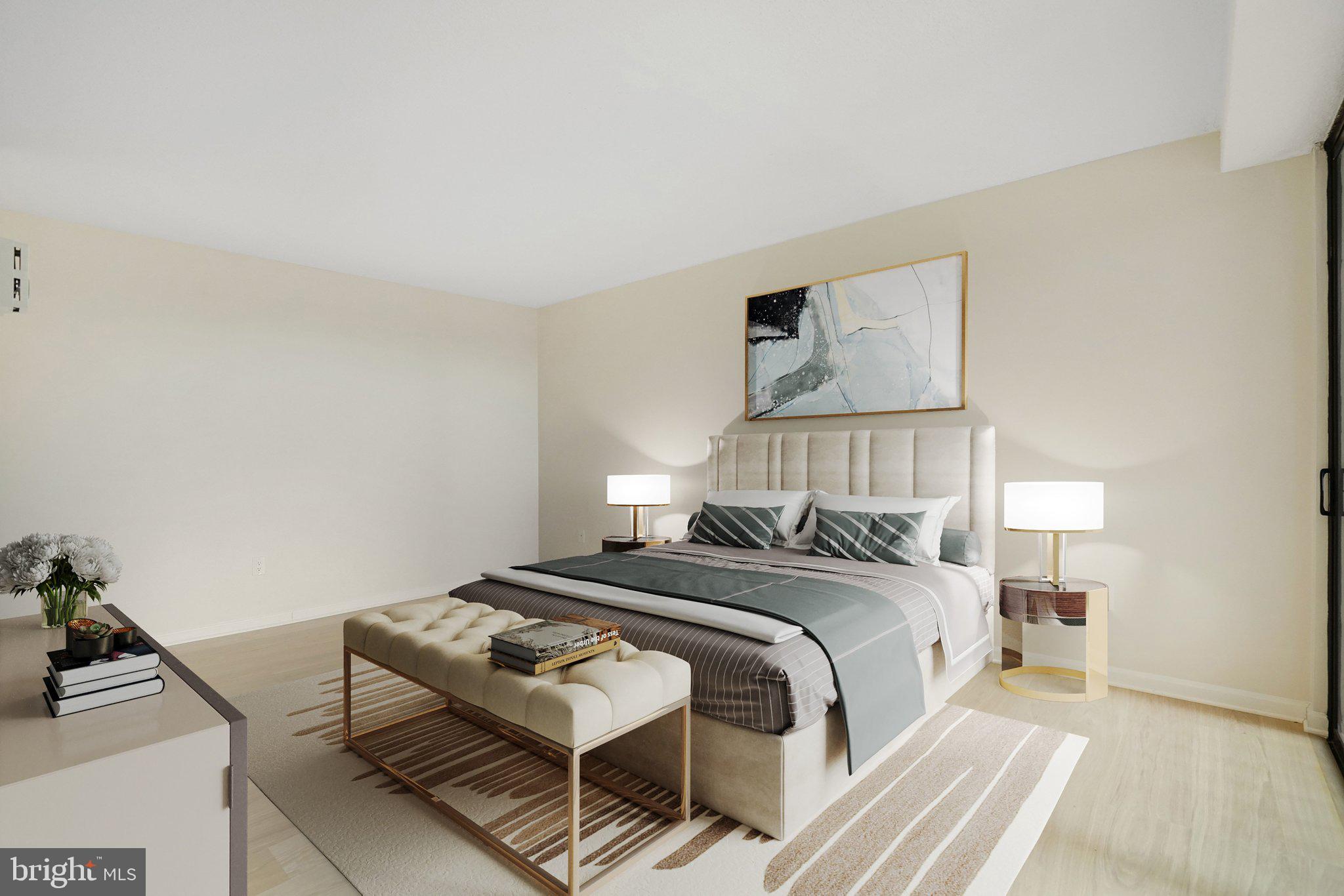 4141 North Henderson Road, Unit 303 Arlington, VA 22203 - Photo 6 of 37 a bedroom with a bed and wooden floor