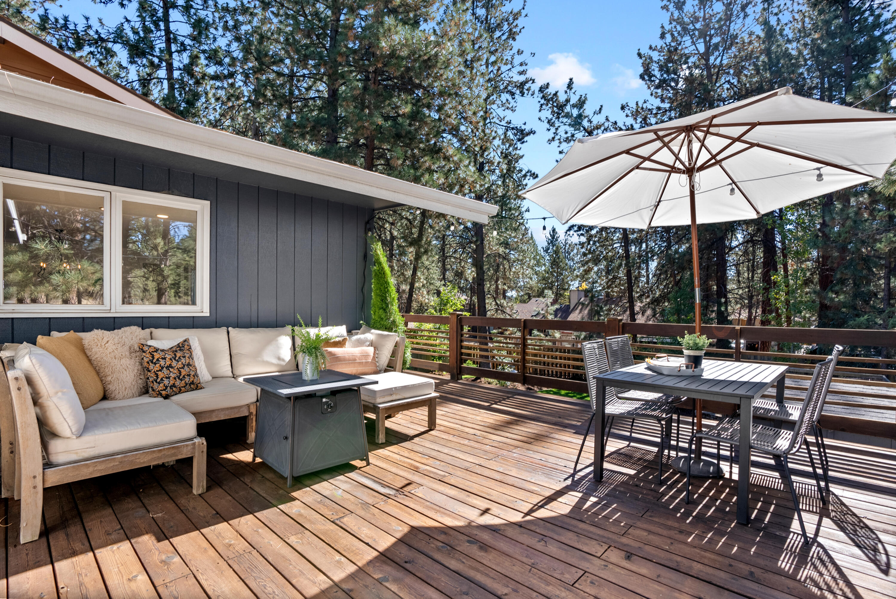 1961 Southwest Knoll Avenue Bend, OR 97702 - Photo 3 of 53 an outdoor sitting area with furniture and wooden deck