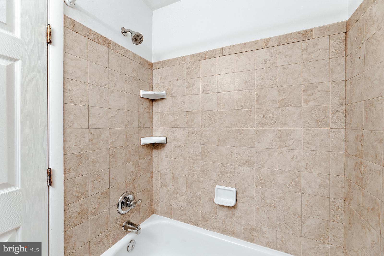 12450 Knights Road, Unit 2 Philadelphia, PA 19154 - Photo 21 of 43 a bathroom with a shower