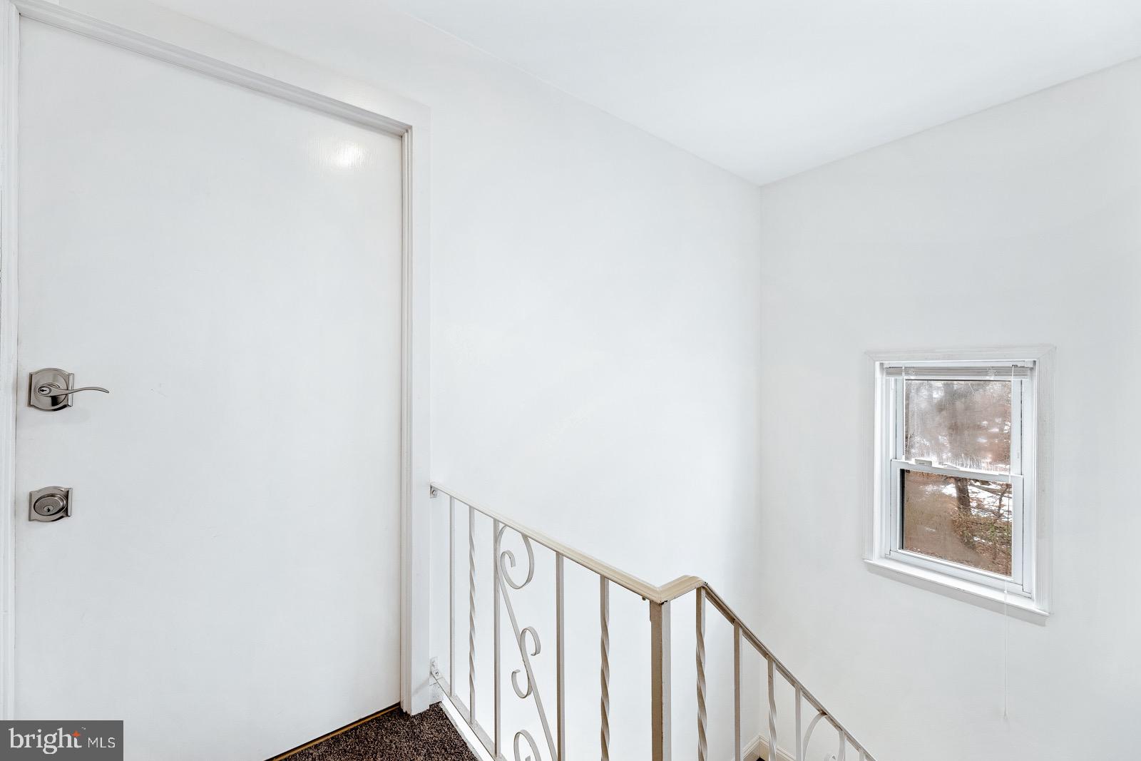 12450 Knights Road, Unit 2 Philadelphia, PA 19154 - Photo 22 of 43 a view of a hallway with windows