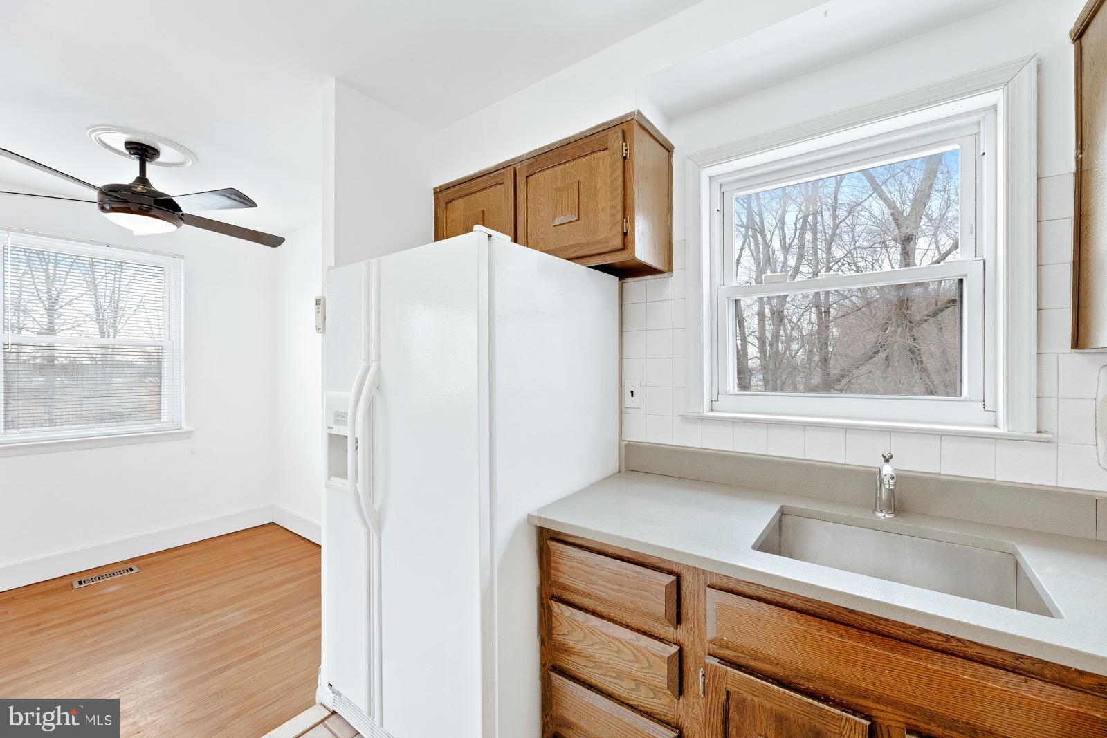 12450 Knights Road, Unit 2 Philadelphia, PA 19154 - Photo 28 of 43 a bathroom with a sink and a window