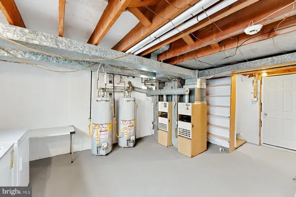 a view of a room with white walls