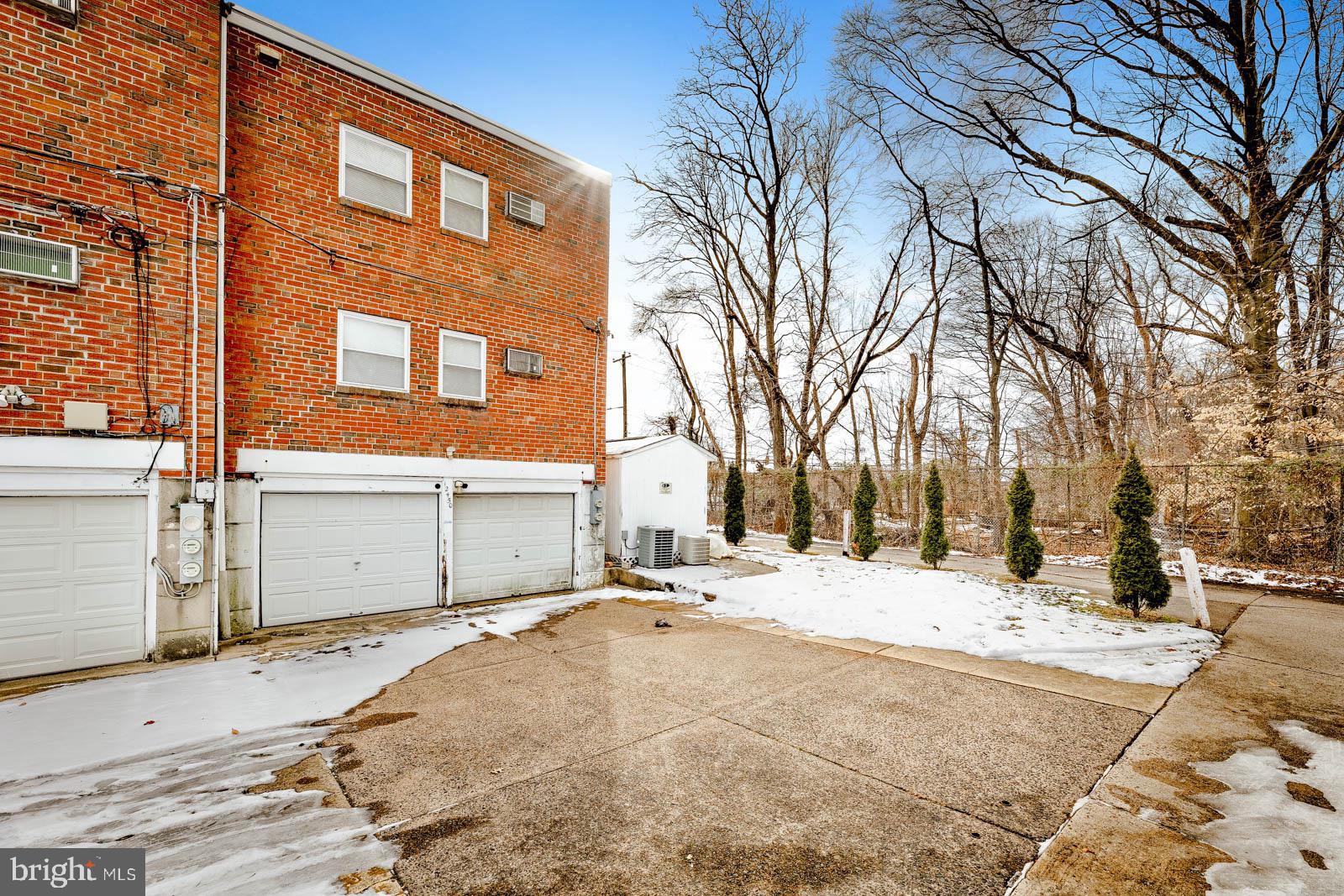 12450 Knights Road, Unit 2 Philadelphia, PA 19154 - Photo 42 of 43 a view of a building with a snow