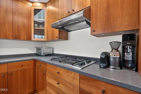 a room with water view and large windows