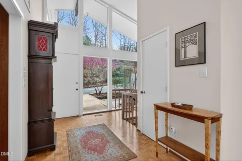 a view of room with window and furniture