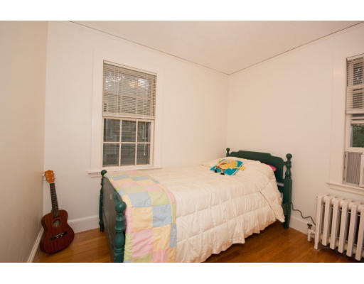 14 Robbins Road Lexington, MA 02421 - Photo 23 of 27 a bedroom with a bed and a window