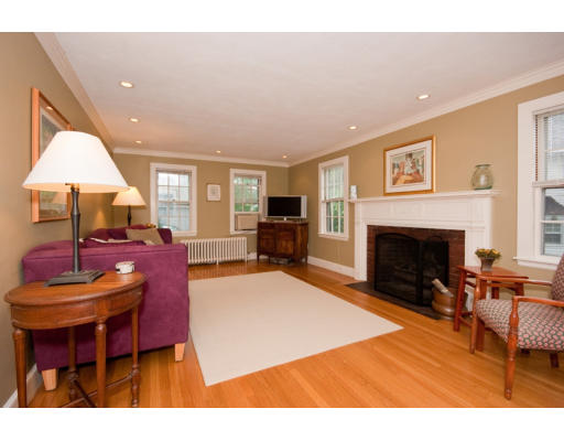 14 Robbins Road Lexington, MA 02421 - Photo 3 of 27 a living room with furniture a fireplace and a table