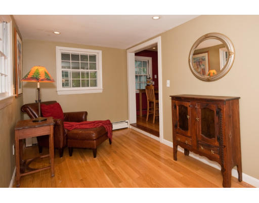 14 Robbins Road Lexington, MA 02421 - Photo 8 of 27 a living room with furniture a window and a flat screen tv