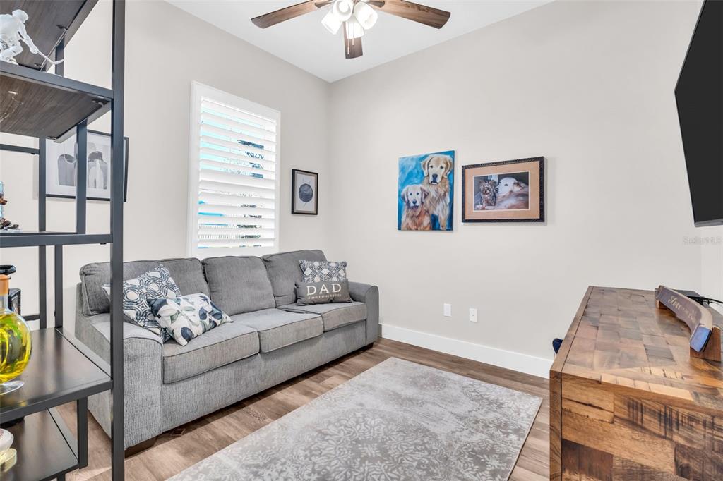 9840 West Bay Street Seminole, FL 33776 - Photo 25 of 75 a living room with furniture and a window