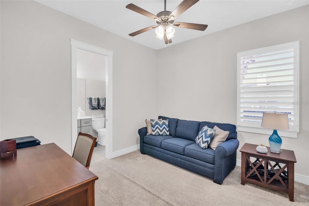 9840 West Bay Street Seminole, FL 33776 - Photo 29 of 75 a living room with furniture and a window