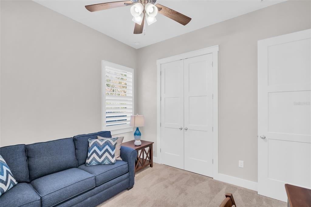9840 West Bay Street Seminole, FL 33776 - Photo 30 of 75 a living room with furniture and a window
