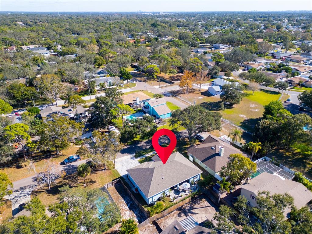 9840 West Bay Street Seminole, FL 33776 - Photo 61 of 75 an aerial view of residential houses with outdoor space