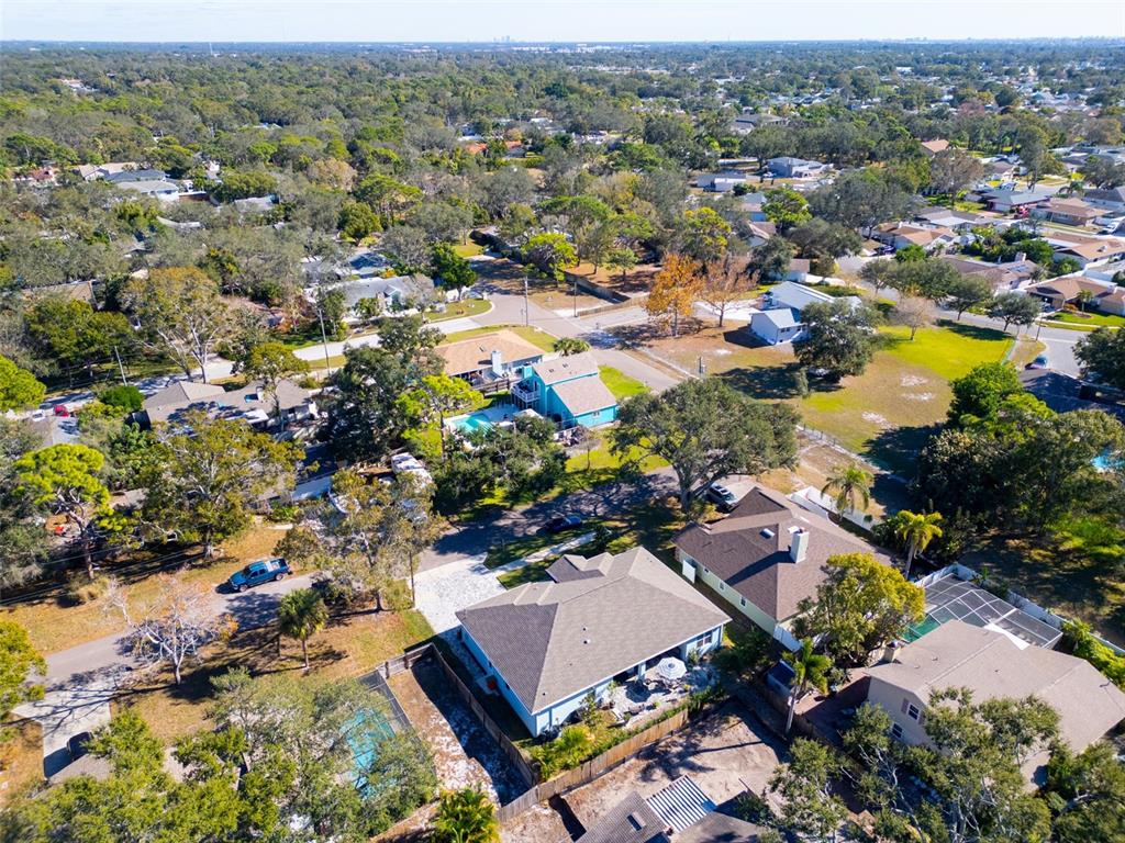 9840 West Bay Street Seminole, FL 33776 - Photo 62 of 75 an aerial view of residential houses with outdoor space