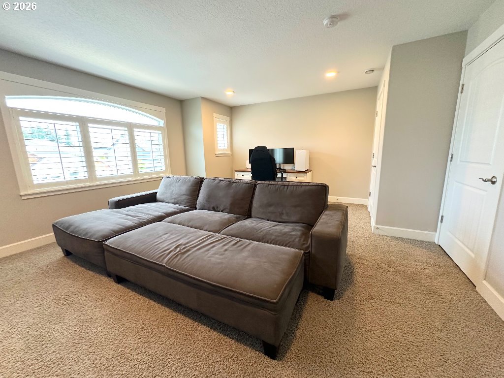 885 North Squire Drive Ridgefield, WA 98642 - Photo 22 of 29 a bedroom with a bed and window