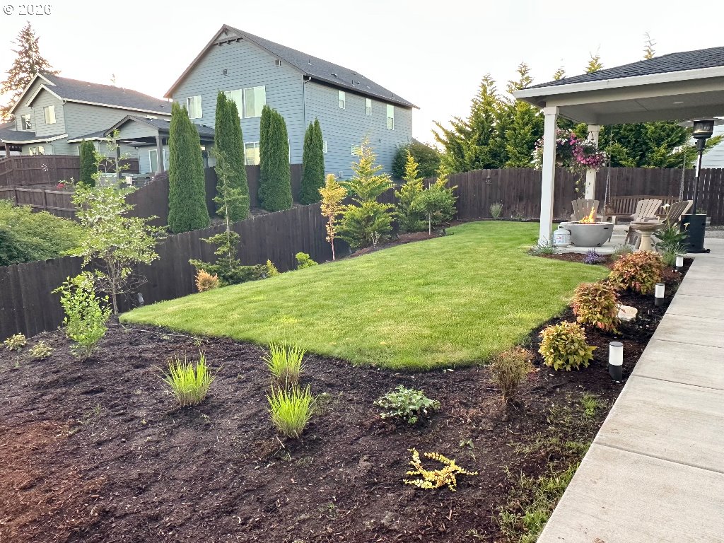885 North Squire Drive Ridgefield, WA 98642 - Photo 24 of 29 a view of a backyard with garden